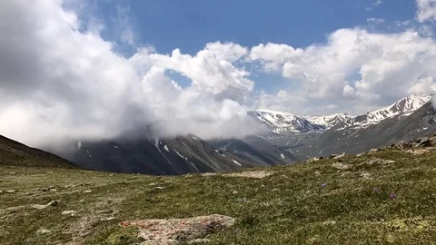 Time lapse  video of heavenly cloudscape over Mountains. Stock Footage 78023680