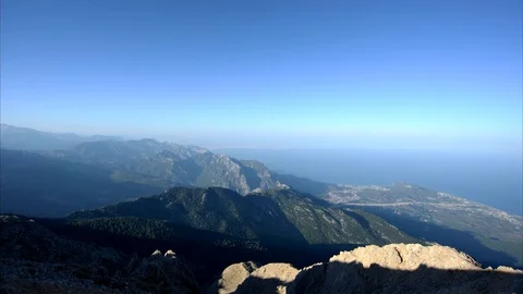 Time lapse video of high angle mountain landscape shadows move as the sun sets Stock Footage 82204790