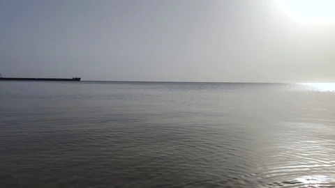 Time Lapse video of a huge barge that floats at horizon level. The concept of ri Video stock 127150747