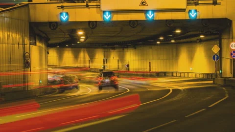 Time lapse video of night traffic through the tunnel Stock Footage 88054243