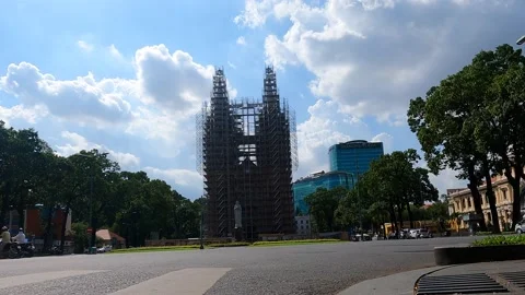 Time-lapse video of Notre-Dame Cathedral Basilica of Saigon in sunny day Stock Footage 153140354