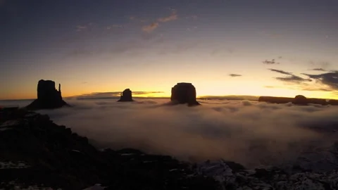 Time lapse video of a panoramic view of Monument Valley USA at sunrise in winter Stock Footage 237752508