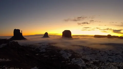 Time lapse video of a panoramic view of Monument Valley, USA, at sunrise Stock Footage 237755937