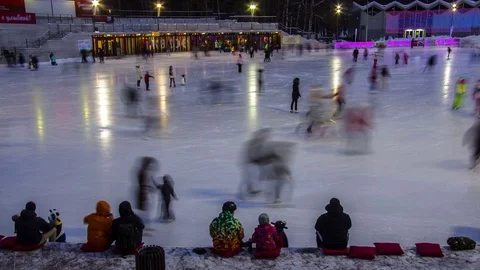 Time lapse video of people having fun on skating rink Stock Footage 70753432