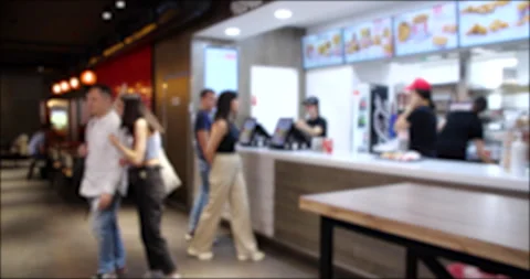 Time Lapse video of People Ordering from the Fast Food restaurant. Blurred Stock Footage 260348580