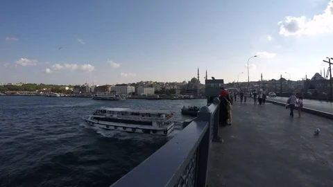 Time lapse video of people sightseeing on the Galata Bridge in Istanbul Stock Footage 82193591