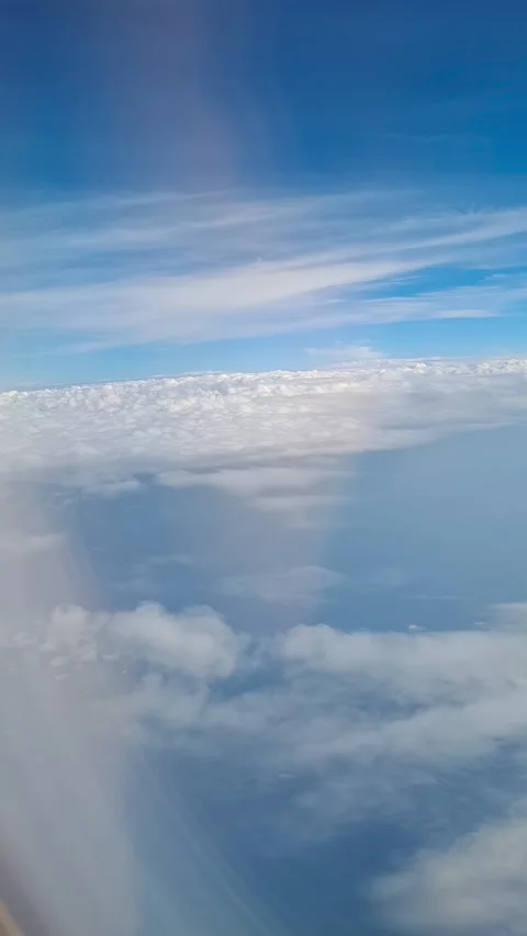 Time-lapse video of a plane flying over the clouds Stock Footage 335882830
