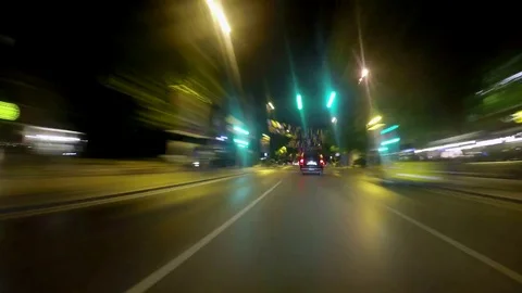 Time lapse video of a point of view car riding in the city Stock Footage 82098672