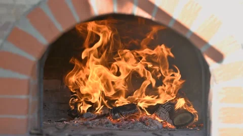 Time-lapse video of preparing fire in a wood fired oven for pizza Stock Footage 132763078