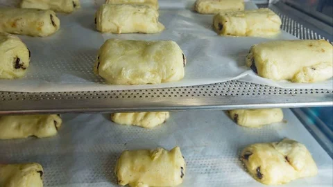 Time lapse video of puff pastry cakes baking in oven Stock Footage 82653273