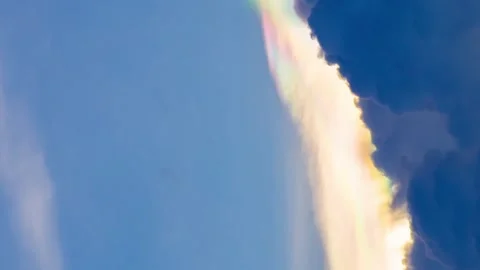 Time lapse video of rainbow-colored hat clouds, or Iridescent Cloud Stock Footage 281053616