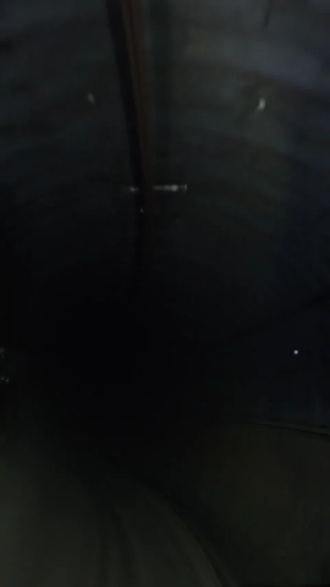 A time lapse video showing a subway train moving through a dark tunnel, sym.. Stock Footage 320988024