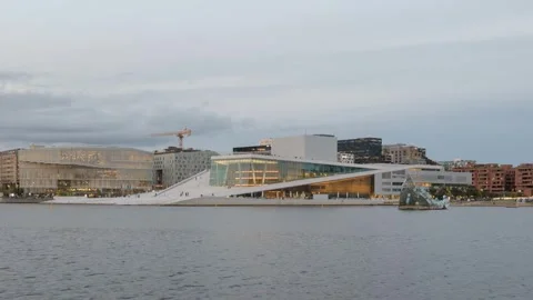 This time-lapse video in slow motion captures the Oslo Opera House at dusk. Stock Footage 252765909