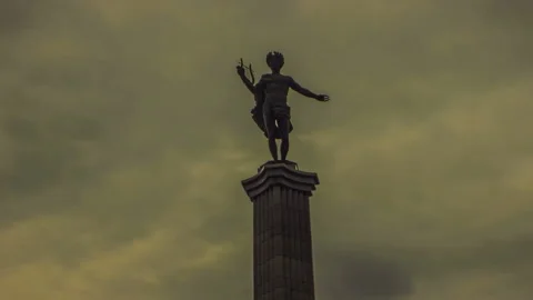 Time lapse video statue of Apollo clouds in the sky Video stock 212821640