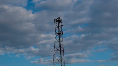 Time - Lapse Video Telecommunication Tower with Moving cloud and blue sky . Time Stock-Footage 105157253