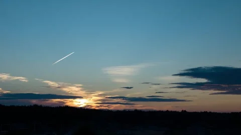 Time lapse video of the traces of the aircrafts at sunset Stock Footage 343359991