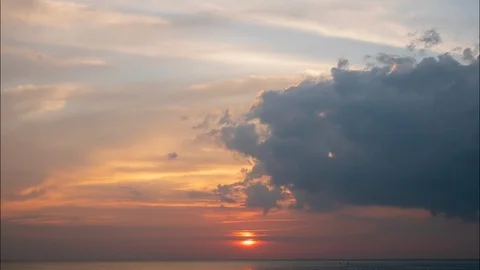 Time lapse video video Scene of Colorful sunset with Moving clouds background Stock Footage 102205077