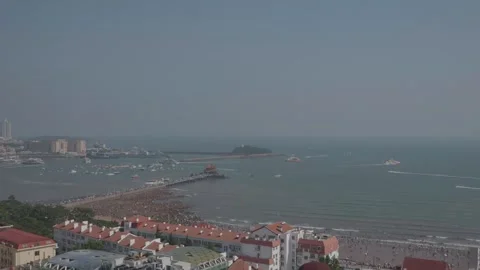 Time-lapse video, watching the seaside city from a distance Stock Footage 336796275