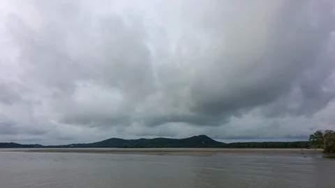 Time lapse Video of white cloud moving on sky at the beach Stock-Footage 99535826
