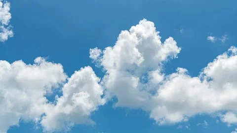 Time lapse Video of white cloud moving on blue sky in the afternoon.  Stock Footage 116530342