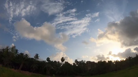 Time-Lapse video of white clouds and beautiful sunset. Stock Footage 130020921