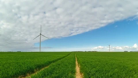Time lapse video of wind turbines of a power plant for electricity generation Stock Footage 74632645