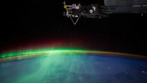 Time lapse view of Aurora Borealis over Canada from the space in 4K Stock Footage 74285593