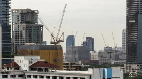 Time lapse view of Bangkok high-rise buildings and construction cranes Stock Footage 204073013