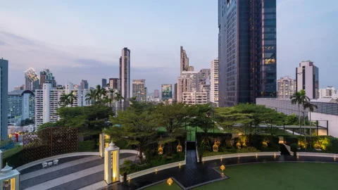 Time lapse view of Bangkok high-rises  on cloudy day with moving clouds Stock Footage 230910944