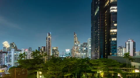 Time lapse view of Bangkok high-rises at night showing building lights Stock Footage 230910982