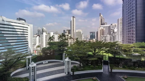 Time lapse view of Bangkok high-rises  on cloudy day with moving clouds Stock Footage 230911577