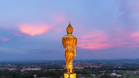 Time lapse view of the blessing buddha statue at Wat Phra That Khao Noia Stock Footage 96728357