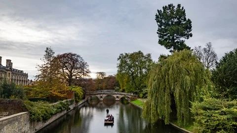 Time lapse view of boats punting on the river Cam in Cambridge Stock Footage 101435228