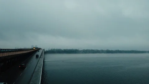 Time lapse view on a bridge over the river. Motion lapse of fog on the river. Cl Stock-Footage 122320269