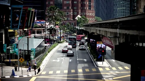 Time lapse view of Bukit Bintang and monorail with busy traffic on daylight Video stock 88659220