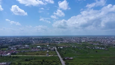 Time lapse view of the busy city of Banjarmasin with sky and clouds in the .. Stock Footage 281391216