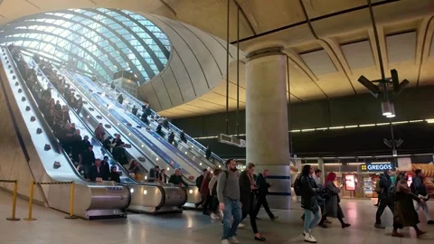 Time lapse view of the busy metro station of Canary Wharf in London Stock Footage 310836104