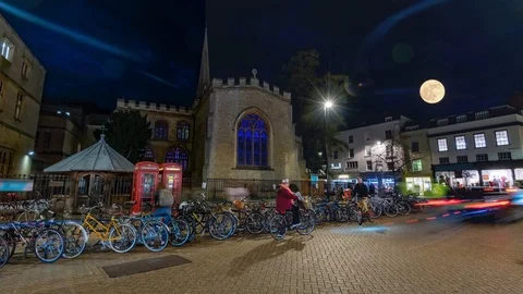 Time lapse view of Cambridge at night with full moon Stock Footage 101640077
