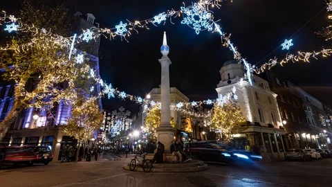 Time lapse view of Christmas lights and decorations in Covent Garden, London Stock Footage 100984457