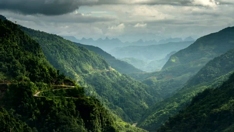 Time lapse view of clouds moving over dramatic Thai An road mountain pass Stock Footage 286248701