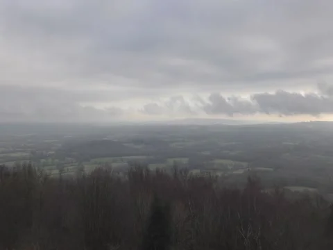 Time lapse. View of the clouds over the forest and fields. Stock Footage 71824730