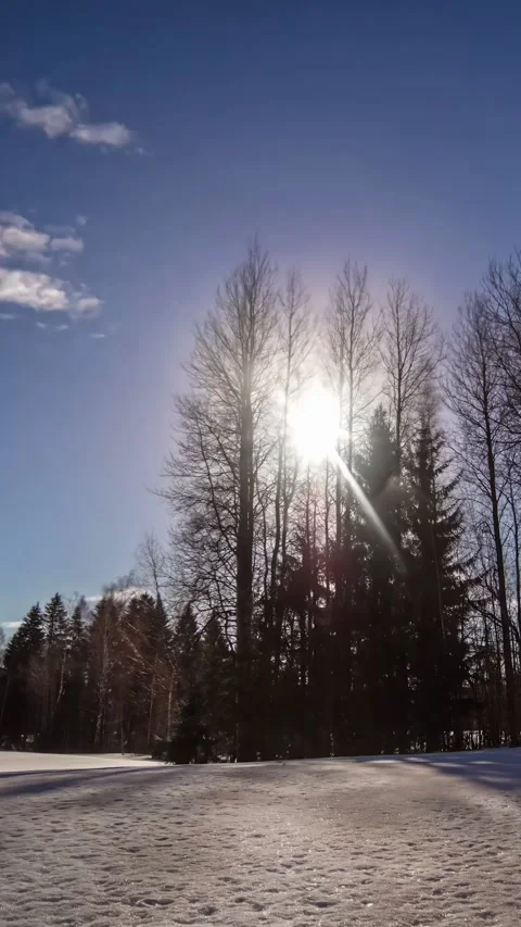Time lapse view of clouds passing with sun gradually setting during noon Stock Footage 317626135