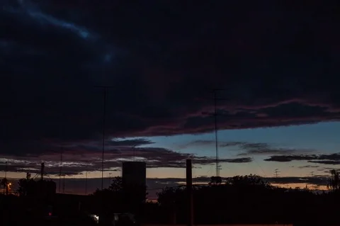 Time lapse view of clouds in sky as night falls Stock Footage 75184867