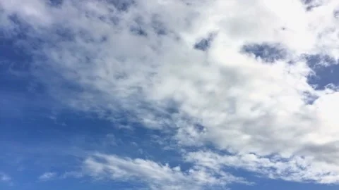 Time lapse view of cloudy blue sky in the day Stock Footage 238442913