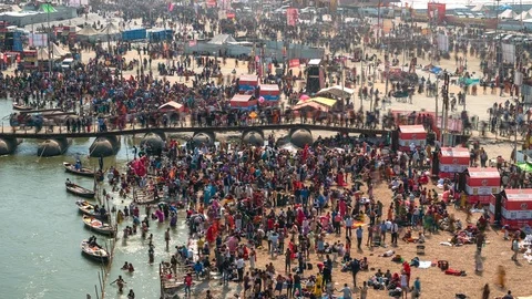 Time Lapse View of Crowd at Kumbh Mela Festival in Allahabad, India, Zoom Out Stock Footage 104523707