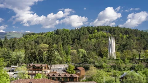Time lapse view of Dilijan city in Armenia with mountains and blue sky Stock Footage 240931444