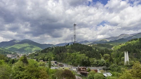 Time lapse view of Dilijan city in Armenia with mountains and blue sky Stock Footage 240931485