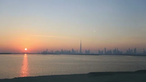 Time lapse view of Dubai skyscraper and Burj Khalifa at sunset Stock Footage 45804677