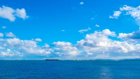 Time - lapse view on fast moving clouds above the river Tejo Stock Footage 90258126