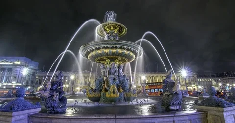 Time lapse view of a fountain at night in Place de la Concorde in Paris Stock Footage 70795370
